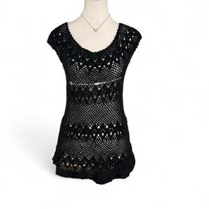 Black crochet top with a boho vibe. Size: L Perfect Spring + Summer Staple Piece